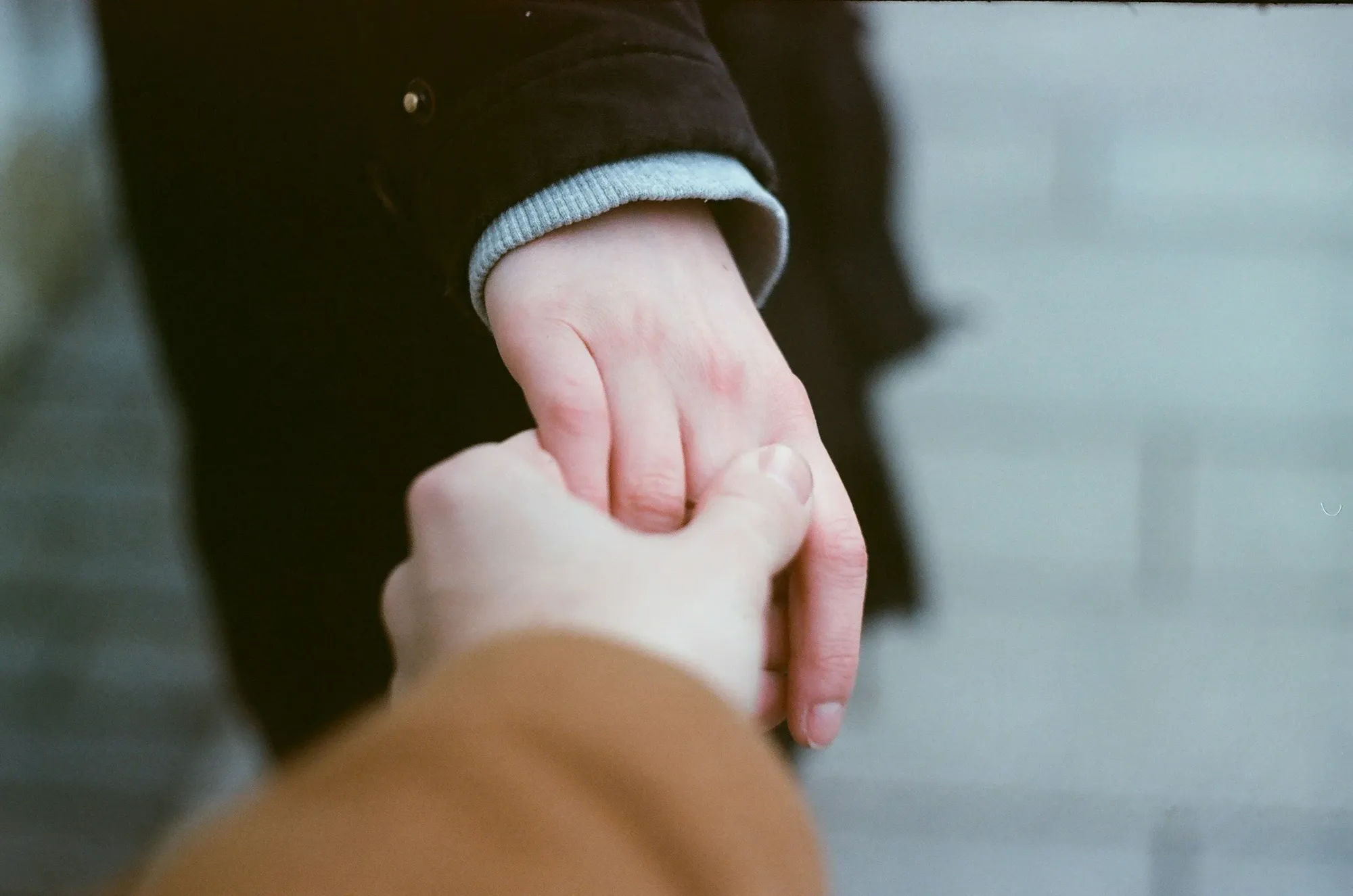 Warm handshake implying reconnecting and staying in touch