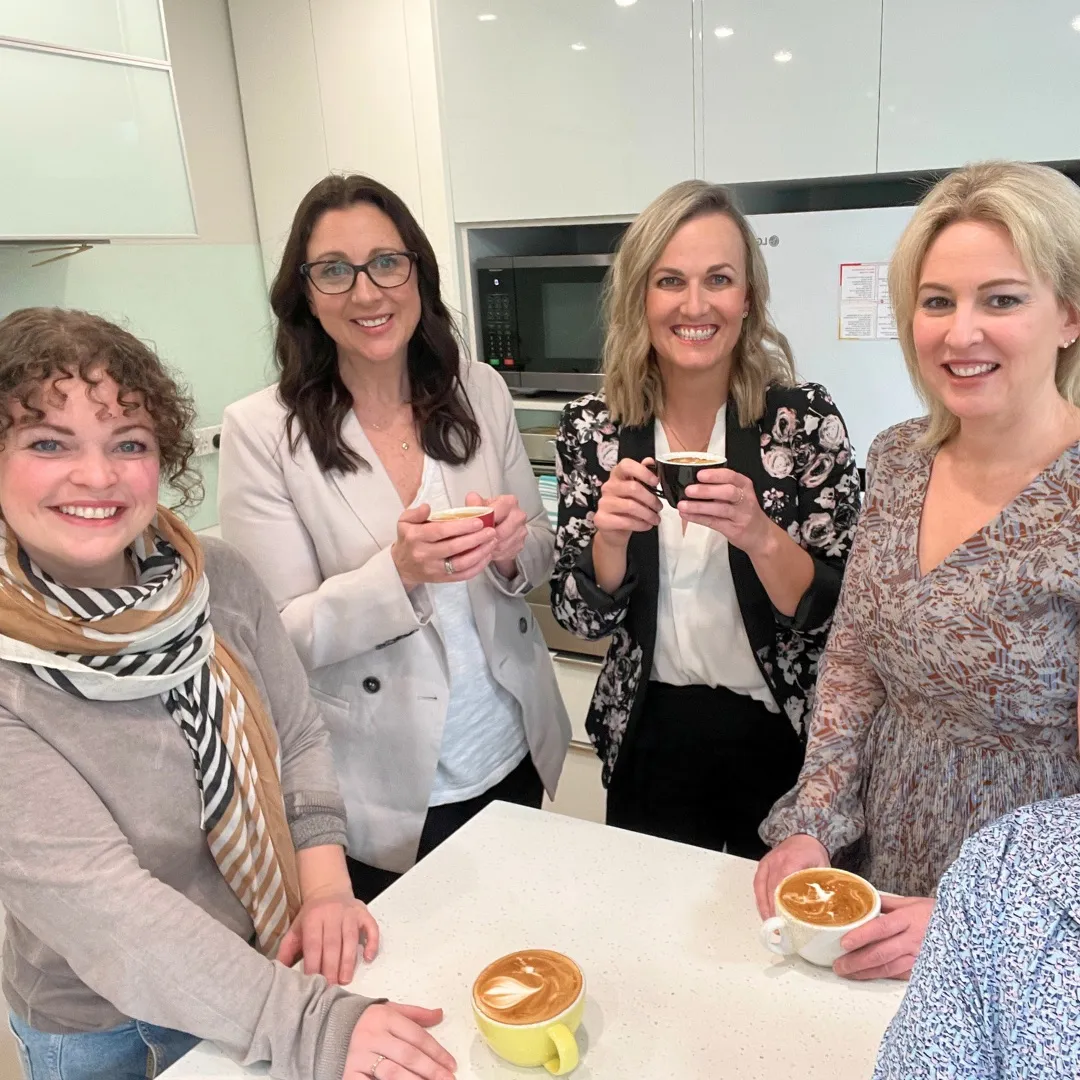 C i Marketing team planning a client’s digital strategy in Christchurch office over coffee